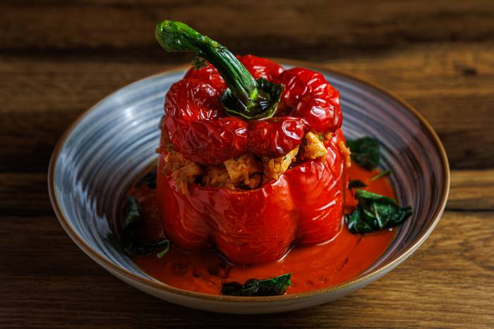 Stuffed peppers with tofu in tomato sauce