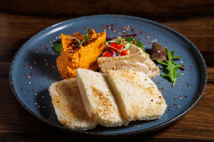 Hummus and eggplant spread with bread